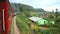 NUWARA ELIYA, SRI LANKA - MARCH 2014: View of the Nuwara Eliya countryside from the moving train. The Sri Lankan railway transport