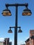 NYC Subway antique Outdoor lights against blue sky