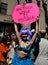 NYC: Woman with Sign at Easter Parade