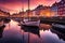 Nyhavn iconic canal in Copenhagen, Denmark. Colorful sunrise image and breathtaking water reflections