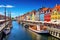 Nyhavn is one of the most popular tourist destinations in Copenhagen, Denmark. Amazing historical city center. Nyhavn New Harbour