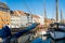 Nyhavn pier with color buildings, ships, yachts and other boats in Copenhagen, Denmark