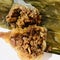 Nyonya Chang, glutinous rice dumpling with pandan leaves. close up details. Melaka food concept.