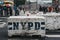 NYPD concrete barrier blocks deployed on the street in New York, USA.