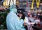 NYPD Police officer seen talking to a street entertainer in Times Square, New York City, USA.