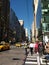 NYPD Traffic Officer at the Intersection of 5th Avenue and 42nd Street, Pedestrians in the Crosswalk, New York City, NYC, NY, USA