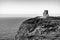 O`Brien`s Tower on the Cliffs of Moher in Ireland in black and white