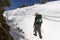 O Cebreiro, Spain - Young Pilgrim Girl Trudging through the Snow along the Way of St James Camino de Santiago