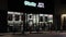 O\\\'Reilly Auto Parts retail store at night people inside exterior view