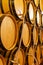 Oak barrels with different types of wine in Italian winery, tasting and sale of wine