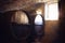 Oak barrels in an historic wine cellar of piedmont Italy