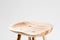 Oak chair with anatomically shaped seat on white background