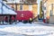 OAKHAM, RUTLAND, ENGLAND- 25 JANUARY 2021: Royal Mail worker outside a Royal Mail van on a snowy day