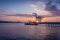 Oakland shipping cranes at dusk