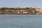 An oasis of palm trees and greenery photo. Embankment along the beach in Makadi, Egypt