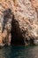 Ð¡oastal landscape with narrow dark cave, Malta