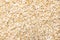 Oat cereal flake. Closeup of grains, background use.