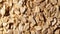 Oat flakes, moving background - top view