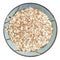Oat flakes with wheat bran in round bowl isolated