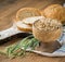 Oat flour, grain oats, oat bread on wooden