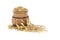 Oat grains with husk or hulls in wooden barrel