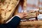 Oath at the newlyweds on luxuriously decorated bible, hands of men and women in the church near the altar