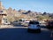 Oatman - driving a SUV thru famous ghost golden mine town on route 66 - American holidays