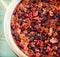 Oatmeal, black currant and walnut casserole, close-up