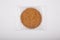 Oatmeal cookie in a plastic pack on a white