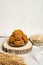 The oatmeal cookies or healthy cereal oat crackers. Crispy anzac biscuit cookie with oat flakes on rustic table