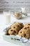 Oatmeal cookies raisin milk.