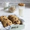 Oatmeal cookies raisin milk.