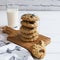 Oatmeal cookies raisin milk.