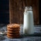 Oatmeal cookies with raisins, chocolate and milk in bottles, wood background