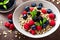 Oatmeal with fresh berries on textured table