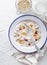 Oatmeal with fresh milk and fruit