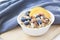 Oatmeal porridge with blueberries. Superfood for healthy breakfast