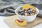 Oatmeal porridge with blueberries. Superfood for healthy nutritious breakfast