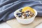 Oatmeal porridge with blueberries. Superfood for healthy nutritious breakfast