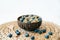 Oatmeal porridge in bowl with fresh blueberries.Healthy vegan Breakfast cereals, against background of brown natural seaweed