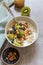 Oatmeal porridge with kiwi, blueberries and pistachios
