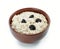 Oatmeal  with prunes in ceramic bowl isolated white background