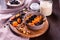 Oatmeal with raisins, dried apricots, plums, in the bowl