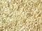 Oatmeal. Rolled oats background texture. Background useful oatmeal for tomorrow. Porridge for athletes and weight loss.