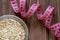 Oats in a glass bowl with measuring tape