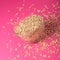 Oats in a glass bowl with a pink coloured background