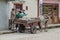 OBANDO, COLOMBIA - SEPTEMBER 14, 2015: Workers are loading a horse ca