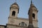 Obelisk and bell tower at famous landmark spanish steps rome italy