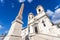 Obelisk and church Trinita dei Monti in Rome city