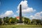 Obelisk at the Karolinenplatz in Munich at sunshine